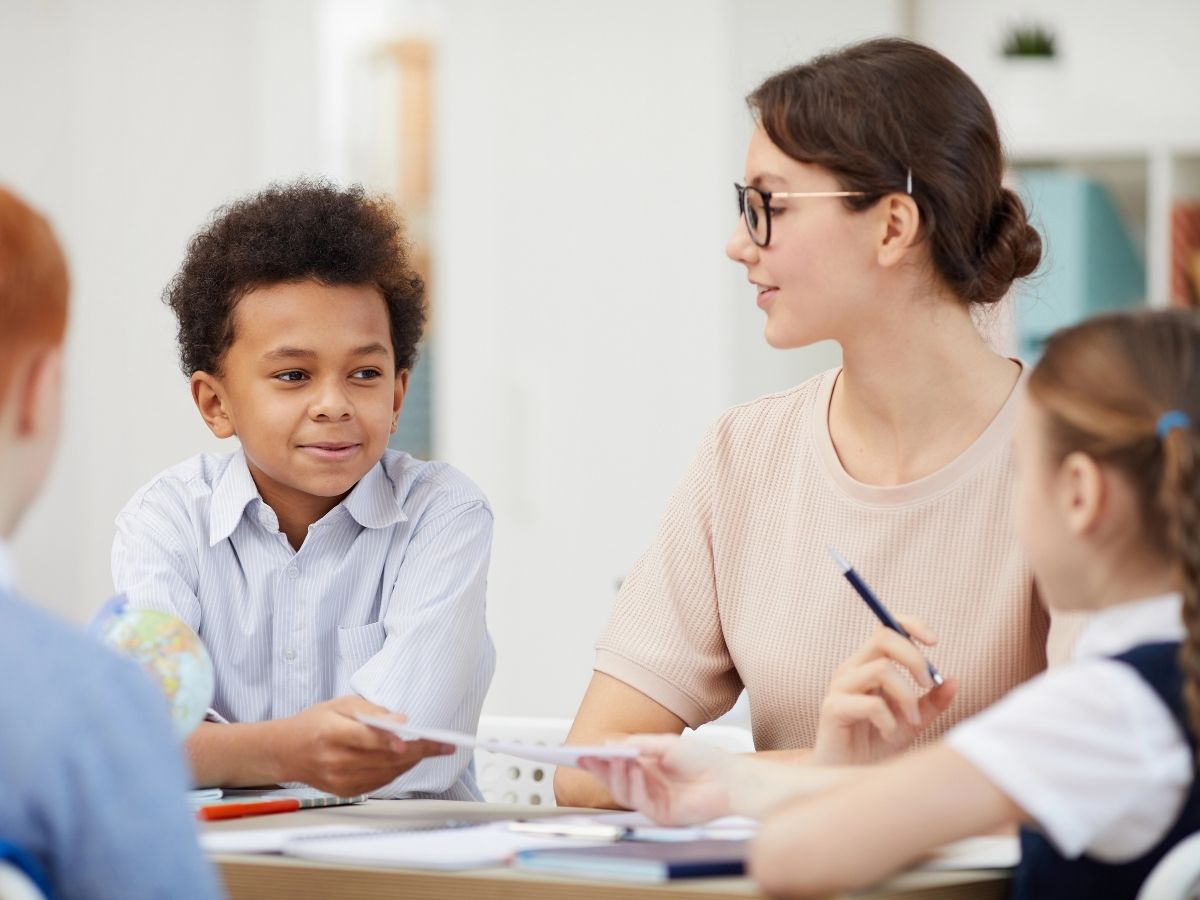 A newer SLP working with a young student